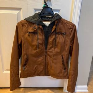 Beautiful faux leather short jacket, cognac color with knit hood. Excellent